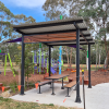 Manchester Shelter with Wood Grain Western Red Cedar Aluminium Slat Screen
